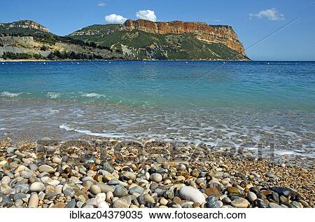 Bestouan beach with turquoise colored sea, rear Soubeyranes cliffs, Cassis, Bouches-du-Rhône, Provence-Alpes-Côte d'Azur, France, Europe View Large Photo Image Stock Photography - Bestouan beach with turquoise colored sea, rear Soubeyranes cliffs, Cassis, Bouches-du-Rhône, Provence-Alpes-Côte d'Azur, France, Europe. Fotosearch