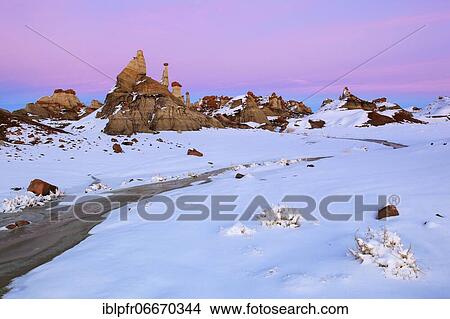 Bisti Badlands, monolith and rock column formed from clay and sandstone, in winter, Bisti Wilderness, New Mexico, USA, North America View Large Photo Image Picture - Bisti Badlands, monolith and rock column formed from clay and sandstone, in winter, Bisti Wilderness, New Mexico, USA, North America. Fotosearch