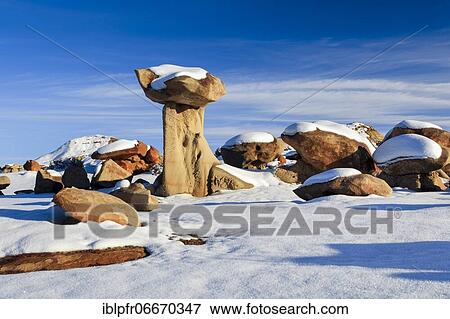 Bisti Badlands, monolith and rock column formed from clay and sandstone, in winter, Bisti Wilderness, New Mexico, USA, North America View Large Photo Image Stock Photo - Bisti Badlands, monolith and rock column formed from clay and sandstone, in winter, Bisti Wilderness, New Mexico, USA, North America. Fotosearch