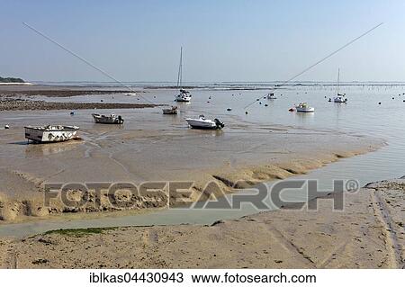 Boats at low tide, Ile-d'Aix, Atlantic Coast, Charente-Maritime, France, Europe View Large Photo Image Stock Image - Boats at low tide, Ile-d'Aix, Atlantic Coast, Charente-Maritime, France, Europe. Fotosearch
