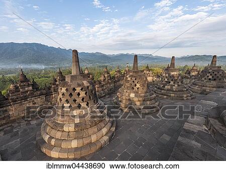 Borobudur Temple Complex, cloudy sky, stupas, Borobudur, Yogyakarta, Java, Indonesia, Asia View Large Photo Image Stock Image - Borobudur Temple Complex, cloudy sky, stupas, Borobudur, Yogyakarta, Java, Indonesia, Asia. Fotosearch