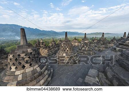 Stock Photo - Borobudur Temple Complex, cloudy sky, stupas, Borobudur, Yogyakarta, Java, Indonesia, Asia. Fotosearch