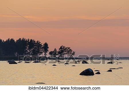 Boulders in water, evening light at Baltic Sea coast, Gulf of Finland, Eisma, Estonia, Europe View Large Photo Image Picture - Boulders in water, evening light at Baltic Sea coast, Gulf of Finland, Eisma, Estonia, Europe. Fotosearch