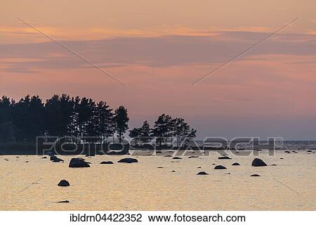 Boulders in water, evening light at Baltic Sea coast, Gulf of Finland, Eisma, Estonia, Europe View Large Photo Image Stock Image - Boulders in water, evening light at Baltic Sea coast, Gulf of Finland, Eisma, Estonia, Europe. Fotosearch