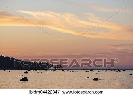 Boulders in water, evening light at Baltic Sea coast, Gulf of Finland, Eisma, Estonia, Europe View Large Photo Image Stock Photo - Boulders in water, evening light at Baltic Sea coast, Gulf of Finland, Eisma, Estonia, Europe. Fotosearch