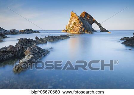 Stock Image - Bow Fiddle Rock, Scotland, Great Britain. Fotosearch