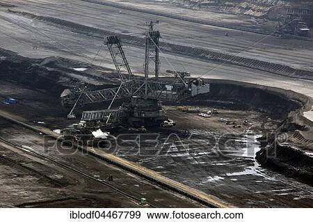 Brown coal surface mine Garzweiler, North Rhine-Westphalia, Germany, Europe View Large Photo Image Stock Photo - Brown coal surface mine Garzweiler, North Rhine-Westphalia, Germany, Europe. Fotosearch