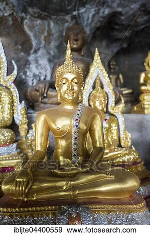 Stock Photo - Buddha figures, Tiger Cave Temple, Wat Tham Suea, Krabi Province, Thailand, Asia. Fotosearch