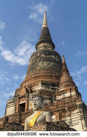 Buddha statue in front of large Chedi, Wat Yai Chai Mongkhon, Ayutthaya Historical Park, Thailand, Asia View Large Photo Image Stock Photograph - Buddha statue in front of large Chedi, Wat Yai Chai Mongkhon, Ayutthaya Historical Park, Thailand, Asia. Fotosearch