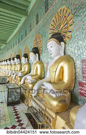 Stock Image - Buddha statues, Umin Thounzeh pagoda, Sagaing, near Mandalay, Myanmar, Asia. Fotosearch
