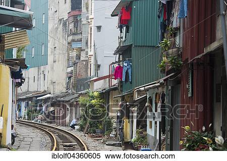 Stock Photography - Buildings near train tracks, Hanoi, Vietnam, Asia. Fotosearch