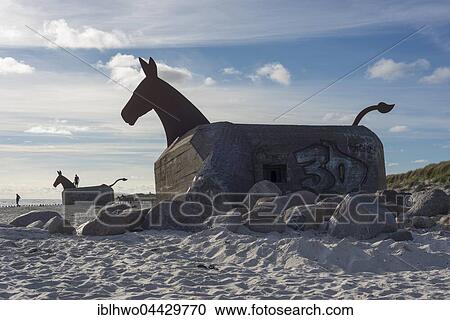 Bunker Mulies by Bill Woodrow, bunkers of the Atlantic Wall, transformed into mules, Nordseebad Blåvand, Region of Southern Denmark, Denmark, Europe View Large Photo Image Stock Image - Bunker Mulies by Bill Woodrow, bunkers of the Atlantic Wall, transformed into mules, Nordseebad Blåvand, Region of Southern Denmark, Denmark, Europe. Fotosearch