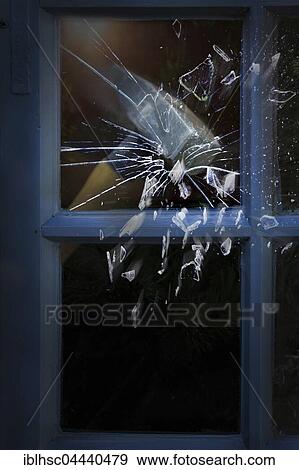 Stock Photo - Burglary, hammer smashes window. Fotosearch