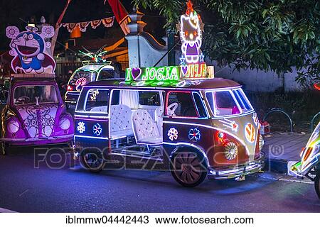 Stock Image - Car illuminated with colourful LEDs, pedal car, Yogyakarta, Indonesia, Asia. Fotosearch