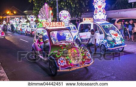 Stock Image - Car illuminated with colourful LEDs, pedal car, Yogyakarta, Indonesia, Asia. Fotosearch