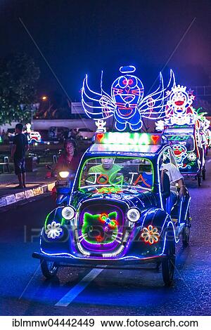 Stock Photo - Car illuminated with colourful LEDs, pedal car, Yogyakarta, Indonesia, Asia. Fotosearch
