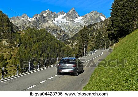 Stock Photograph - Car on mountain road, Susten Pass, Uri Alps, Canton of Bern, Switzerland, Europe. Fotosearch