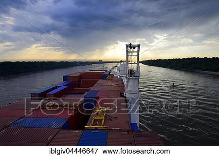 Cargo ship with containers, dusk, Elbe, Hamburg, Germany, Europe View Large Photo Image Stock Photo - Cargo ship with containers, dusk, Elbe, Hamburg, Germany, Europe. Fotosearch