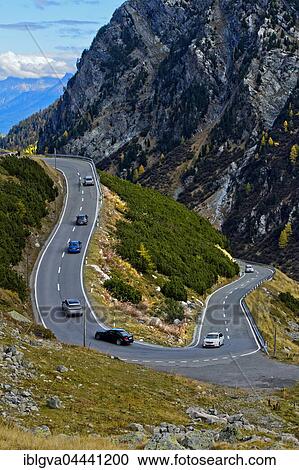 Cars on a mountain road in a hairpin curve, Flüela Pass, Davos, Grisons, Switzerland, Europe View Large Photo Image Stock Image - Cars on a mountain road in a hairpin curve, Flüela Pass, Davos, Grisons, Switzerland, Europe. Fotosearch