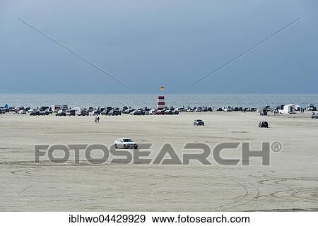 Cars parked on wide sandy beach, Rømø, North Sea, Southern Denmark, Denmark, Europe View Large Photo Image Stock Photo - Cars parked on wide sandy beach, Rømø, North Sea, Southern Denmark, Denmark, Europe. Fotosearch