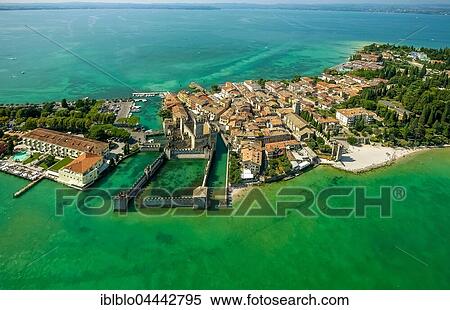 Castello Scaligero, Scaliger Castle, Sirmio peninsula on Lake Garda, Sirmione, Lombardy, Italy, Europe View Large Photo Image Stock Photography - Castello Scaligero, Scaliger Castle, Sirmio peninsula on Lake Garda, Sirmione, Lombardy, Italy, Europe. Fotosearch