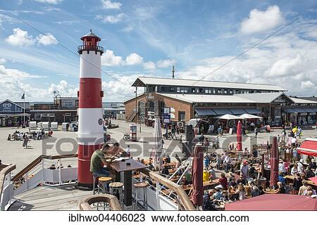 Central Square at the port of List, View from seafood restaurant Gosch on the old Tonnenhalle, List, Sylt, Schleswig-Holstein, Germany, Europe View Large Photo Image Stock Image - Central Square at the port of List, View from seafood restaurant Gosch on the old Tonnenhalle, List, Sylt, Schleswig-Holstein, Germany, Europe. Fotosearch