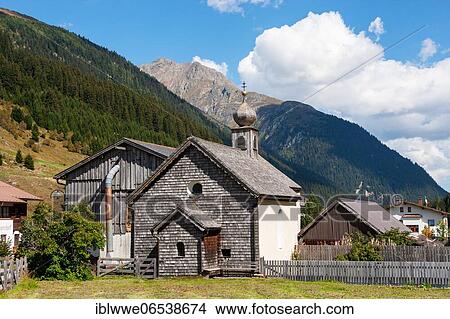 Picture - Chapel covered with wooden shingles in Galtür, Paznauntal, Tyrol, Austria, Europe. Fotosearch