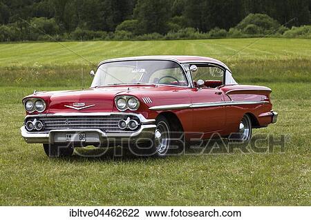 Chevrolet Belair, built in 1958, red, Arvika Car Meet, Arvika, Värmland, Sweden, Europe View Large Photo Image Stock Image - Chevrolet Belair, built in 1958, red, Arvika Car Meet, Arvika, Värmland, Sweden, Europe. Fotosearch