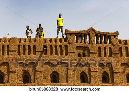 Children on roof, Yama Mosque, Sudano-Sahel Architecture, Yaama, Niger, Africa View Large Photo Image Stock Photo - Children on roof, Yama Mosque, Sudano-Sahel Architecture, Yaama, Niger, Africa. Fotosearch
