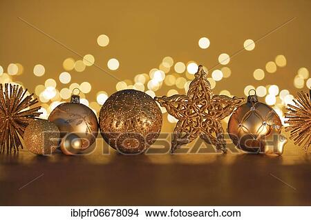 Picture - Christmas decoration in gold. Fotosearch