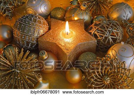 Stock Image - Christmas decoration in gold. Fotosearch