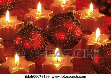 Christmas decoration with Christmas tree balls and star shaped candles View Large Photo Image Stock Photo - Christmas decoration with Christmas tree balls and star shaped candles. Fotosearch