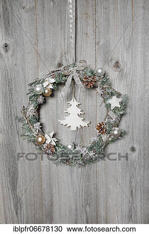 Christmas wreath on wooden wall View Large Photo Image Stock Image - Christmas wreath on wooden wall. Fotosearch