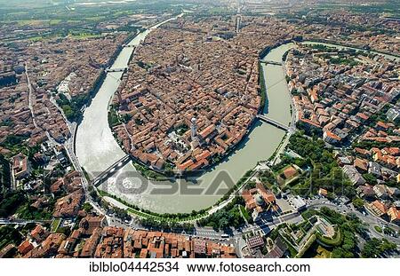 Picture - City view, Adige River, river bend, Province of Verona, Veneto, Italy, Europe. Fotosearch