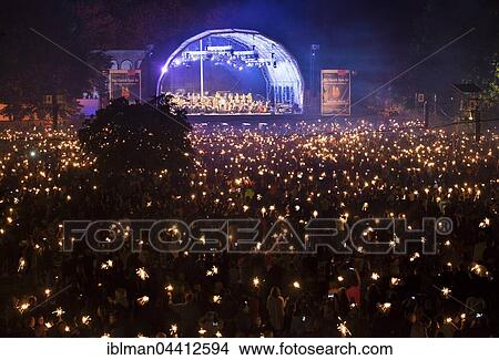 Classical open air Concert at the picnic in the park with Nuremberg Symphonic Orchestra, audience with miracle candles, Luitpoldhain, Nuremberg, Middle Franconia, Franconia, Bavaria, Germany, Europe View Large Photo Image Picture - Classical open air Concert at the picnic in the park with Nuremberg Symphonic Orchestra, audience with miracle candles, Luitpoldhain, Nuremberg, Middle Franconia, Franconia, Bavaria, Germany, Europe. Fotosearch