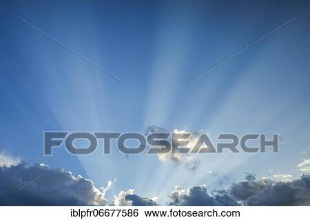 Clouds in a blue sky View Large Photo Image Stock Photograph - Clouds in a blue sky. Fotosearch