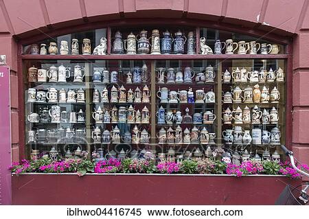 Collection of steins in window of restaurant Københavneren in Helsingor, Capital Region of Denmark View Large Photo Image Stock Photography - Collection of steins in window of restaurant Københavneren in Helsingor, Capital Region of Denmark. Fotosearch