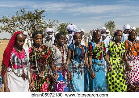 Colourful dressed women at a trribal festival, Sahel, Chad, Africa View Large Photo Image Stock Image - Colourful dressed women at a trribal festival, Sahel, Chad, Africa. Fotosearch