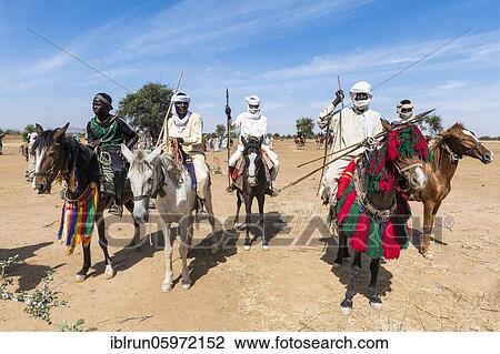 Colourful horse riders at a Tribal festival, Sahel, Chad, Africa View Large Photo Image Stock Image - Colourful horse riders at a Tribal festival, Sahel, Chad, Africa. Fotosearch