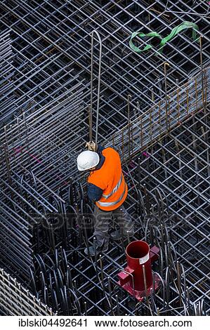 Stock Image - Construction workers processing reinforcing steel for reinforced concrete ceiling, Bavaria, Germany, Europe. Fotosearch
