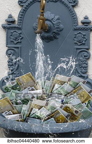 Counterfeit money in fountain with water running, Symbolism View Large Photo Image Stock Image - Counterfeit money in fountain with water running, Symbolism. Fotosearch
