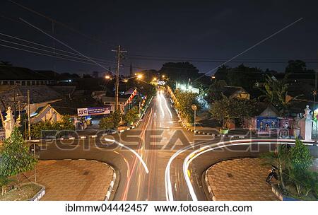 Crossroads, street at night with light streaks, blurred car lights, Yogyakarta, Java, Indonesia, Asia View Large Photo Image Stock Photo - Crossroads, street at night with light streaks, blurred car lights, Yogyakarta, Java, Indonesia, Asia. Fotosearch