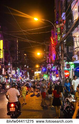 Stock Photography - Crowd on Pham Ngu Lao Street at night, Backpacker District, Ho Chi Minh City, Vietnam, Asia. Fotosearch