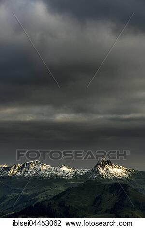 Damülser Horn, highest mountain in the Bregenz Forest Mountains, dark clouds and stormy atmosphere, Damüls, Vorarlberg, Austria, Europe View Large Photo Image Stock Image - Damülser Horn, highest mountain in the Bregenz Forest Mountains, dark clouds and stormy atmosphere, Damüls, Vorarlberg, Austria, Europe. Fotosearch
