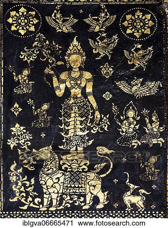 Decorated outer wall of the Sim prayer hall with gilded images of Apsaras, mythological animals, floral motifs and scenes from the Jakata tales in filigree stencil work, Wat Xieng Thong, Luang Prabang, Laos, Asia View Large Photo Image Stock Image - Decorated outer wall of the Sim prayer hall with gilded images of Apsaras, mythological animals, floral motifs and scenes from the Jakata tales in filigree stencil work, Wat Xieng Thong, Luang Prabang, Laos, Asia. Fotosearch