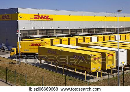 DHL container in logistics center, parcel center, Deutsche Post DHL, Rheinsberg, North Rhine-Westphalia, Germany, Europe View Large Photo Image Stock Photo - DHL container in logistics center, parcel center, Deutsche Post DHL, Rheinsberg, North Rhine-Westphalia, Germany, Europe. Fotosearch