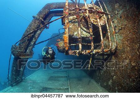 Stock Photo - Diver at El Arish or El Arish El-Tor shipwreck, sunken car ferry, Port Safaga, Red Sea, Egypt, Africa. Fotosearch