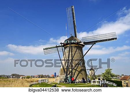 Dutch windmills, UNESCO World Heritage Site Kinderdijk, Alblasserwaard polder, South Holland, The Netherlands, Europe View Large Photo Image Stock Photo - Dutch windmills, UNESCO World Heritage Site Kinderdijk, Alblasserwaard polder, South Holland, The Netherlands, Europe. Fotosearch