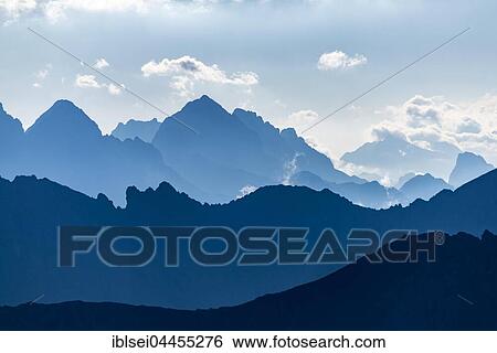 Ehrwald mountains in blue morning mist, Elemen, Lechtal, Bezirk Reutte, Tyrol, Austria, Europe View Large Photo Image Stock Photograph - Ehrwald mountains in blue morning mist, Elemen, Lechtal, Bezirk Reutte, Tyrol, Austria, Europe. Fotosearch