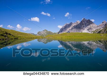 Eissee Lake, Oy Valley, Großer Wilder, 2379m, Hochvogel, Rosszahngruppe, Allgäu Alps, Bavaria, Germany, Europe View Large Photo Image Stock Image - Eissee Lake, Oy Valley, Großer Wilder, 2379m, Hochvogel, Rosszahngruppe, Allgäu Alps, Bavaria, Germany, Europe. Fotosearch